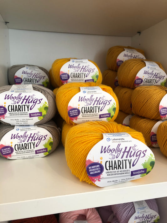 Charity 50g 75% Wolle, 15% Poyamid, 10% sonstige Fasern